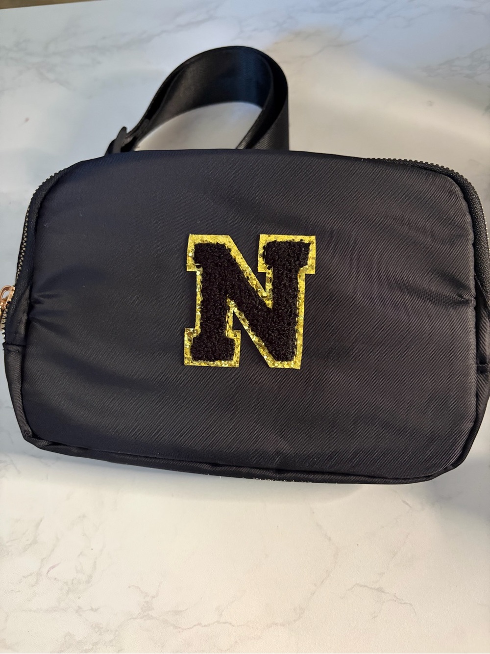 Black Men’s Crossbody Bag with Gold 'N' Patch